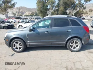 2013 Chevrolet Captiva Sport LT z VIN 3GNAL3EK4DS581063, wystawiony jako IAAI lot #42111098 z przebiegiem 178 301 mil mil oraz . Historia ofert i sprzedaży dostępna na DreamBid. Obrazek 14.