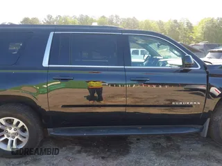 2019 Chevrolet Suburban LS with VIN 1GNSKGKC2KR353977, listed as a IAAI auction lot 42129814 with 85,454 mi miles and . Bid and sale history available at DreamBid. Image 13.