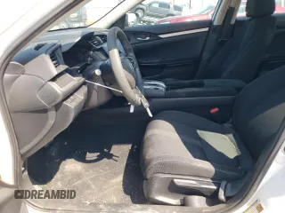 2019 Honda Civic LX with VIN 2HGFC2F61KH504677, listed as a Copart auction lot 66871514 with 88,385 mi miles and Salvage Title. Bid and sale history available at DreamBid. Image 7.