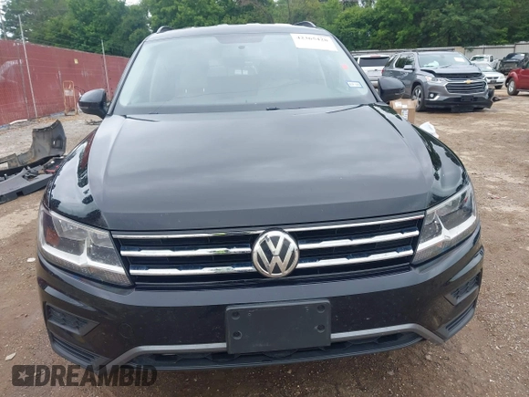 2020 Volkswagen Tiguan S with VIN 3VV1B7AX7LM102966, listed as a IAAI auction lot 42365428 with 94,921 mi miles and . Bid and sale history available at DreamBid. Image 13.
