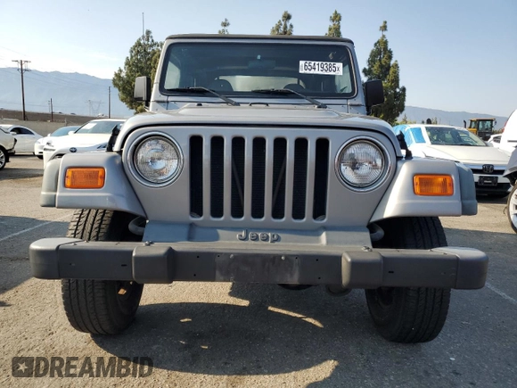 2000 Jeep Wrangler SE with VIN 1J4FA29P3YP770094, listed as a Copart auction lot 65419385 with 150,364 mi miles and Clean title. Bid and sale history available at DreamBid. Image 5.