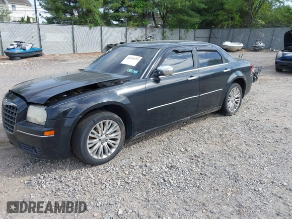 2006 Chrysler 300 Touring with VIN 2C3KA53G36H220558, listed as a IAAI auction lot 42159373 with 158,970 mi miles. Bid and sale history available at carsss.com. Image 2.