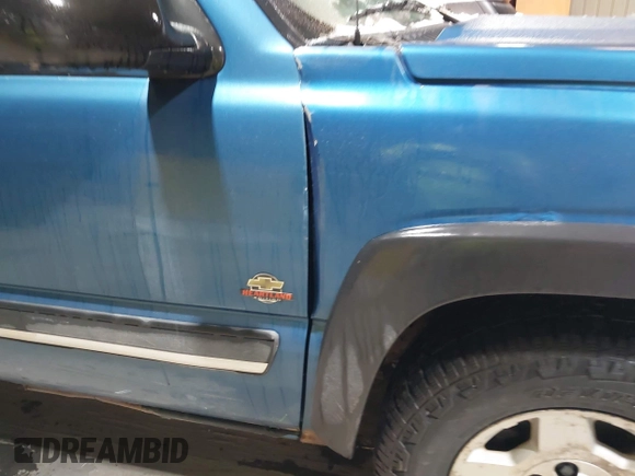 2004 Chevrolet Silverado 1500 with VIN 1GCEK19T14E265358, listed as a IAAI auction lot 41480044 with 227,757 mi miles and . Bid and sale history available at DreamBid. Image 13.
