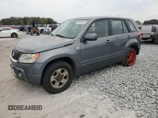 2008 Suzuki Grand Vitara z VIN JS3TE941884100746, wystawiony jako Copart lot #46164185 z przebiegiem 154 221 mil mil oraz Szkoda całkowita • Salvage title. Historia ofert i sprzedaży dostępna na DreamBid. Obrazek 1.