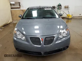 2009 Pontiac G6 GT 1SA z VIN 1G2ZH17NX94187538, wystawiony jako Copart lot #59767455 z przebiegiem 161 105 mil mil oraz Czysty tytuł • Clean title. Historia ofert i sprzedaży dostępna na DreamBid. Obrazek 5.