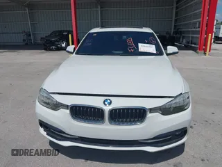 2018 BMW 3 Series 330i with VIN WBA8B9G52JNU57283, listed as a IAAI auction lot 42042507 with 51,740 mi miles and . Bid and sale history available at DreamBid. Image 6.