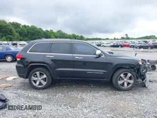 2015 Jeep Grand Cherokee Overland with VIN 1C4RJECG3FC152601, listed as a IAAI auction lot 42414340 with 139,315 mi miles and . Bid and sale history available at DreamBid. Image 13.