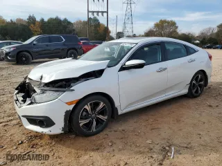 2017 Honda Civic Sedan Touring with VIN 19XFC1F92HE214634, listed as a Copart auction lot 82477704 with 107,680 mi miles and Salvage Title. Bid and sale history available at carsss.com. Image 1.