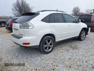 2007 Lexus RX 400h with VIN JTJGW31U572004833, listed as a IAAI auction lot 41938575 with 221,084 mi miles and . Bid and sale history available at DreamBid. Image 4.