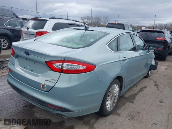 2013 Ford Fusion SE Hybrid with VIN 3FA6P0LUXDR339767, listed as a IAAI auction lot 41920621 with 135,274 mi miles. Bid and sale history available at carsss.com. Image 4.