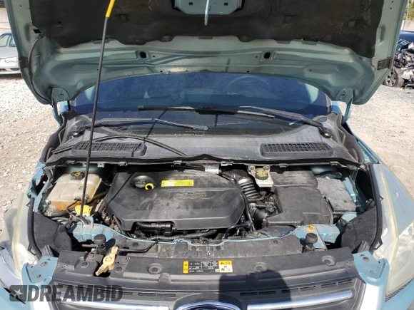 2013 Ford Escape SE z VIN 1FMCU0GX8DUA92814, wystawiony jako Copart lot #61564665 z przebiegiem 110 854 mil mil oraz Szkoda całkowita • Salvage title. Historia ofert i sprzedaży dostępna na DreamBid. Obrazek 11.