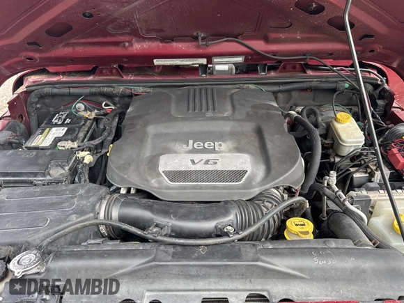 2012 Jeep Wrangler Unlimited Sport with VIN 1C4BJWDG5CL289329, listed as a Copart auction lot 65816775 with 152,632 mi miles and Clean title. Bid and sale history available at DreamBid. Image 7.