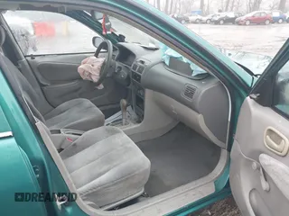 1998 Toyota Corolla VE with VIN 1NXBR12E6WZ094363, listed as a IAAI auction lot 41465384 with 265,919 mi miles and . Bid and sale history available at DreamBid. Image 5.