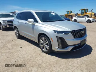 2020 Cadillac XT6 FWD Premium Luxury with VIN 1GYKPCRS7LZ104392, listed as a IAAI auction lot 42278675 with 81,001 mi miles and . Bid and sale history available at DreamBid. Image 1.