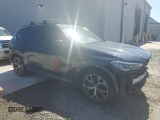 2019 BMW X5 xDrive40i with VIN 5UXCR6C53KLL14710, listed as a Copart auction lot 57408185 with 51,547 mi miles and Salvage title. Bid and sale history available at DreamBid. Image 4.