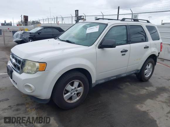 2011 Ford Escape XLT with VIN 1FMCU0D79BKA38578, listed as a IAAI auction lot 41895971 with 223,689 mi miles. Bid and sale history available at carsss.com. Image 19.