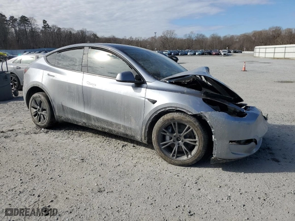 2025 Tesla Model Y Long Range with VIN 7SAYGDEE7SA345606, listed as a Copart auction lot 88669765 with 0 mi miles and Salvage Title. Bid and sale history available at carsss.com. Image 4.