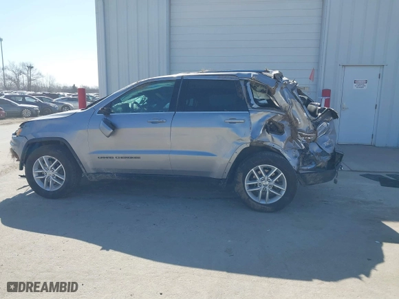 2018 Jeep Grand Cherokee Laredo E with VIN 1C4RJFAG8JC130465, listed as a IAAI auction lot 41789688 with 133,299 mi miles. Bid and sale history available at carsss.com. Image 15.