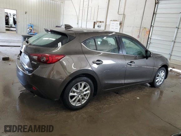 2015 Mazda 3 i Grand Touring with VIN JM1BM1M75F1231814, listed as a Copart auction lot 62692695 with 49,253 mi miles and Salvage title. Bid and sale history available at DreamBid. Image 3.