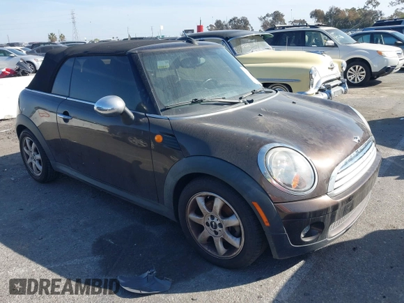 2010 MINI Convertible with VIN WMWMR3C50ATU97550, listed as a IAAI auction lot 41709012 with 86,499 mi miles and . Bid and sale history available at DreamBid. Image 1.