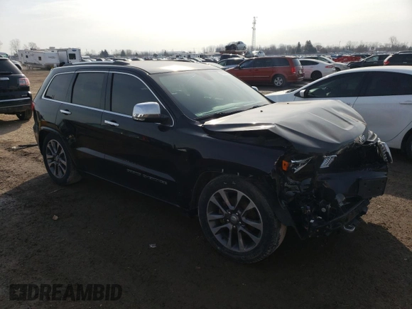 2018 Jeep Grand Cherokee Overland with VIN 1C4RJFCG8JC262591, listed as a Copart auction lot 47814985 with 135,542 mi miles and Salvage Title. Bid and sale history available at carsss.com. Image 4.