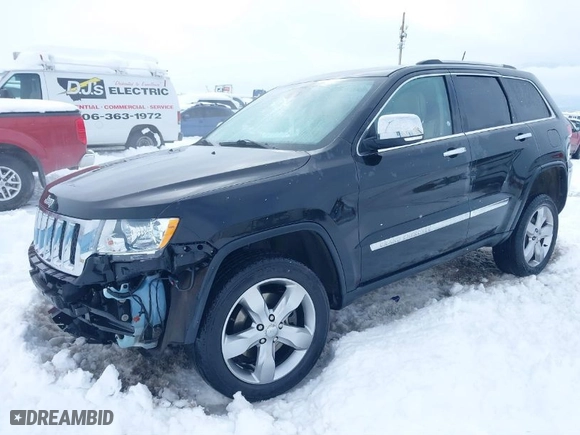2011 Jeep Grand Cherokee Overland with VIN 1J4RR6GT5BC604784, listed as a IAAI auction lot 41515626 with 66,654 mi miles. Bid and sale history available at carsss.com. Image 2.