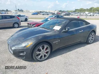 2013 Maserati GranTurismo Convertible Sport with VIN ZAM45MMA2D0069786, listed as a IAAI auction lot 40874830 with 37,312 mi miles. Bid and sale history available at carsss.com. Image 19.