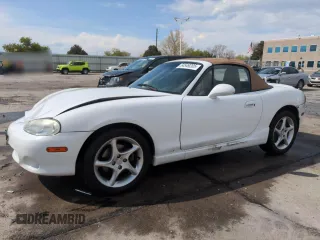 2002 Mazda MX-5 Miata Cloth z VIN JM1NB353X20229549, wystawiony jako Copart lot #54549205 z przebiegiem 79 871 mil mil oraz Szkoda całkowita • Salvage title. Historia ofert i sprzedaży dostępna na DreamBid. Obrazek 1.