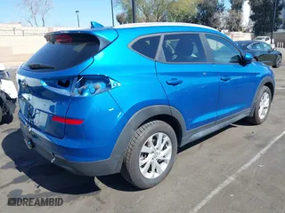 2019 Hyundai Tucson Value with VIN KM8J33A47KU966447, listed as a IAAI auction lot 41631458 with 46,519 mi miles. Bid and sale history available at carsss.com. Image 4.