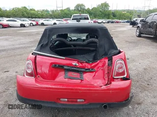 2011 MINI Convertible with VIN WMWZN3C59BTZ89447, listed as a IAAI auction lot 42313009 with 62,009 mi miles and . Bid and sale history available at DreamBid. Image 17.