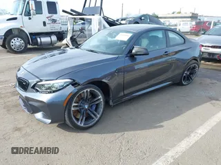 2018 BMW M2 with VIN WBS1J5C50JVE51869, listed as a IAAI auction lot 41814404 with 69,684 mi miles. Bid and sale history available at carsss.com. Image 17.