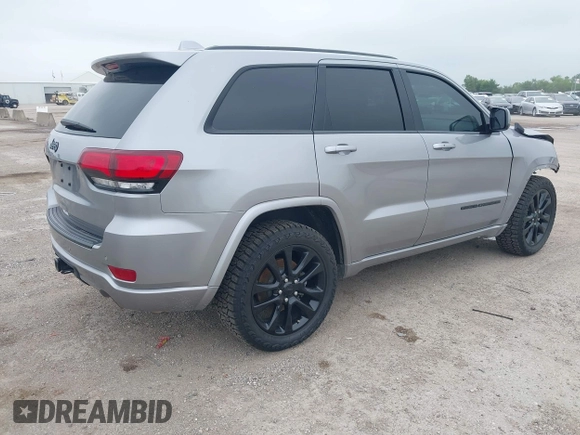 2019 Jeep Grand Cherokee Laredo E with VIN 1C4RJFAG9KC670974, listed as a IAAI auction lot 42333028 with 163,958 mi miles and . Bid and sale history available at DreamBid. Image 4.