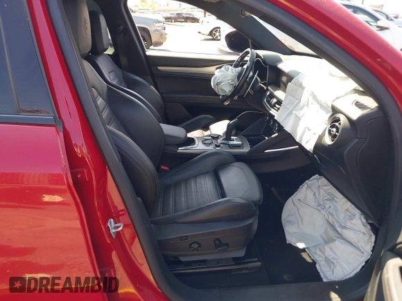 2020 Alfa Romeo Stelvio Ti z VIN ZASPAKBN5L7C73874, wystawiony jako IAAI lot #41996616 z przebiegiem Nie podano mil oraz . Historia ofert i sprzedaży dostępna na DreamBid. Obrazek 5.