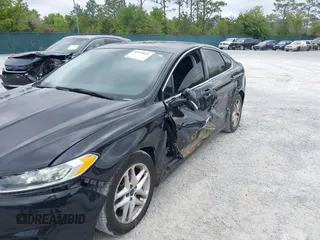 2015 Ford Fusion SE with VIN 3FA6P0HD2FR162756, listed as a IAAI auction lot 42028601 with 210,918 mi miles and . Bid and sale history available at DreamBid. Image 6.