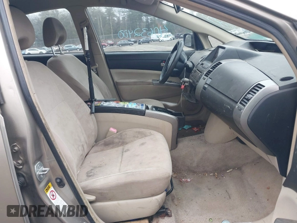 2005 Toyota Prius z VIN JTDKB20U553015603, wystawiony jako IAAI lot #41753696 z przebiegiem 299 999 mil mil oraz . Historia ofert i sprzedaży dostępna na DreamBid. Obrazek 5.