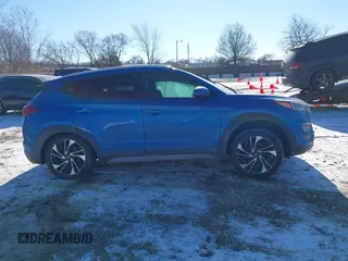 2019 Hyundai Tucson Sport with VIN KM8J33ALXKU857925, listed as a IAAI auction lot 41369786 with 41,365 mi miles. Bid and sale history available at carsss.com. Image 13.