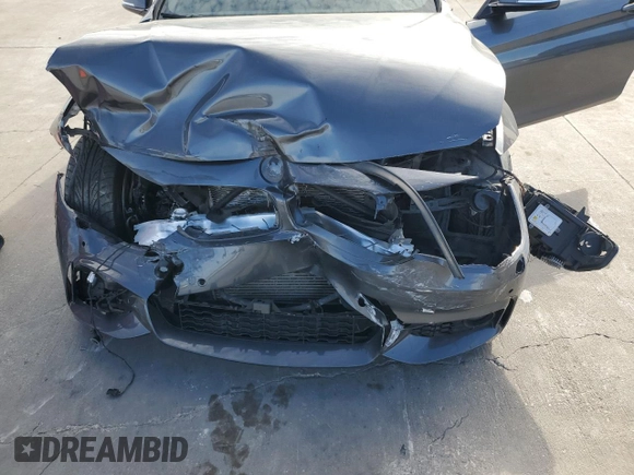 2015 BMW 4 Series 435i xDrive with VIN WBA3T7C53F5A37043, listed as a Copart auction lot 87697145 with 98,031 mi miles and Salvage title. Bid and sale history available at DreamBid. Image 11.