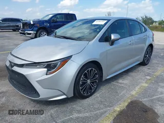 2020 Toyota Corolla LE with VIN JTDEPRAEXLJ023560, listed as a IAAI auction lot 41985501 with 59,529 mi miles. Bid and sale history available at carsss.com. Image 2.