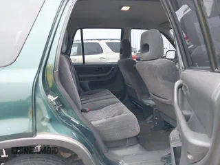 2000 Honda CR-V LX with VIN JHLRD2845YS007348, listed as a IAAI auction lot 41565908 with 168,123 mi miles. Bid and sale history available at carsss.com. Image 8.