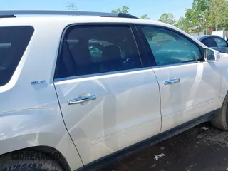 2014 GMC Acadia SLT z VIN 1GKKRRKD3EJ219690, wystawiony jako IAAI lot #42221261 z przebiegiem 103 675 mil mil oraz . Historia ofert i sprzedaży dostępna na DreamBid. Obrazek 14.