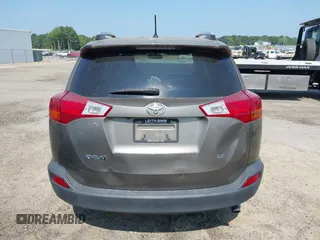 2014 Toyota RAV4 LE with VIN JTMZFREVXED034316, listed as a IAAI auction lot 42610135 with 214,871 mi miles and . Bid and sale history available at DreamBid. Image 17.