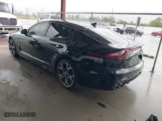 2020 Kia Stinger GT1 with VIN KNAE45LC5L6075904, listed as a IAAI auction lot 40870197 with 51,600 mi miles. Bid and sale history available at carsss.com. Image 3.