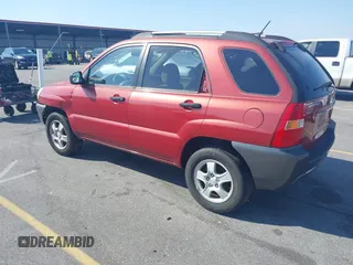 2007 Kia Sportage LX with VIN KNDJF724977426704, listed as a IAAI auction lot 41769772 with 288,082 mi miles and . Bid and sale history available at carsss.com. Image 3.