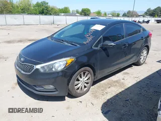 2016 Kia Forte LX with VIN KNAFX4A64G5444265, listed as a IAAI auction lot 42174928 with 211,329 mi miles. Bid and sale history available at carsss.com. Image 2.