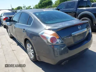 2012 Nissan Altima 2.5 with VIN 1N4AL2AP0CN566515, listed as a IAAI auction lot 41977356 with 294,729 mi miles and . Bid and sale history available at DreamBid. Image 3.