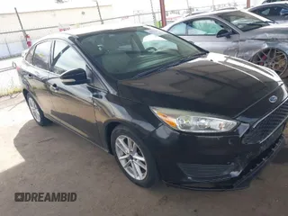 2015 Ford Focus SE with VIN 1FADP3F25FL330463, listed as a IAAI auction lot 41755867 with 72,725 mi miles. Bid and sale history available at carsss.com. Image 1.