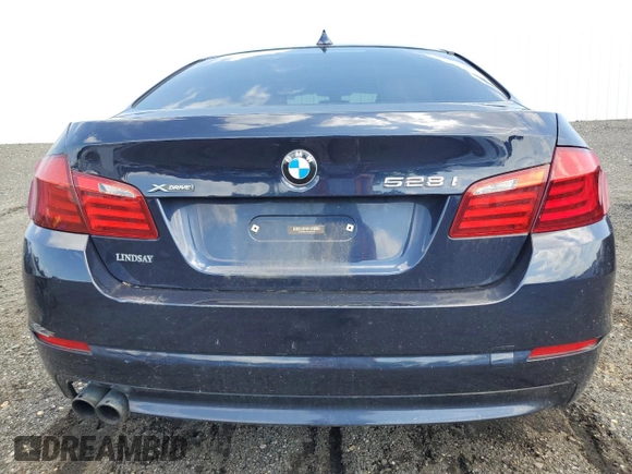 2013 BMW 5 Series 528i xDrive with VIN WBAXH5C58DDW16326, listed as a Copart auction lot 61610565 with Not provided miles and Clean title. Bid and sale history available at DreamBid. Image 6.