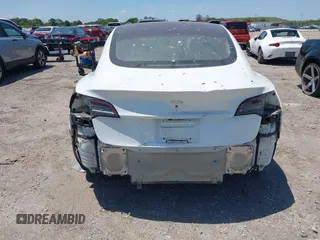 2018 Tesla Model 3 Long Range Battery with VIN 5YJ3E1EAXJF027179, listed as a IAAI auction lot 42059918 with 43,566 mi miles. Bid and sale history available at carsss.com. Image 6.