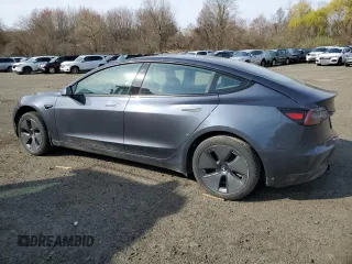 2022 Tesla Model 3 Long Range with VIN 5YJ3E1EB3NF275515, listed as a Copart auction lot 52566515 with 55,980 mi miles and Salvage Title. Bid and sale history available at carsss.com. Image 2.
