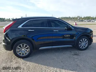 2020 Cadillac XT4 FWD Premium Luxury with VIN 1GYFZCR44LF070832, listed as a IAAI auction lot 41249608 with 77,471 mi miles. Bid and sale history available at carsss.com. Image 13.